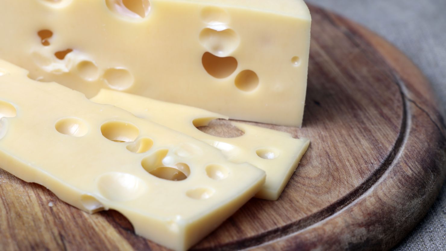 Modern science has established that old-style processing led to the holes in Swiss cheese.