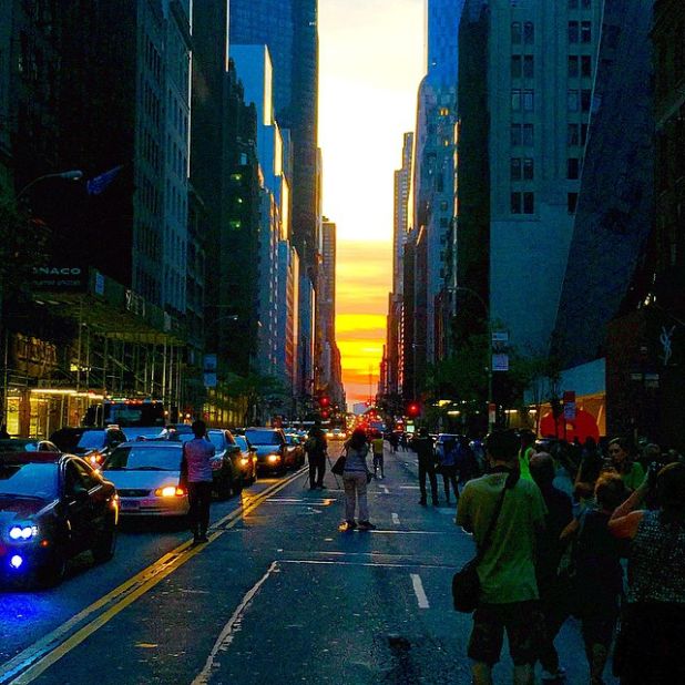 Cloud coverage dampened "Manhattanhenge's" shine on 57th Street, but people were still excited to photograph the sunset Friday evening. <a href="https://instagram.com/p/3STiWBDTeO/" target="_blank" target="_blank">Michael Bello</a> share a photo on Instagram of the event. "Too bad the horizon was hazy and couldn't see the full round sun," he wrote in his post. 