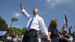 Former Maryland Gov. Martin O'Malley waves as he arrives with his wife Katie O'Malley to an event to announce that he is entering the Democratic presidential race, on Saturday, May 30, 2015, in Baltimore