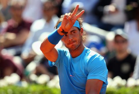 V for victory.-Rafael Nadal was too good for Andrey Kuznetsov to stay on course for a record 10th title in the French Open.