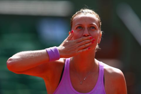 Wimbledon champion Petra Kvitova beat Romanian Irina-Camelia Begu 6-3 6-2 to advance to the fourth round in the women's draw. 