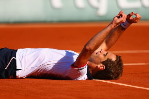 Richard Gasquet shows his relief after seeing off Kevin Anderson of South Africa to earn his match up with Djokovic. 