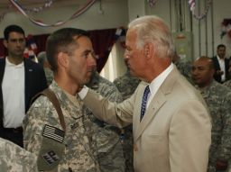Vice President Joe Biden  talks with his son, U.S. Army Capt. Beau Biden at Camp Victory on the outskirts of Baghdad on July 4, 2009. 