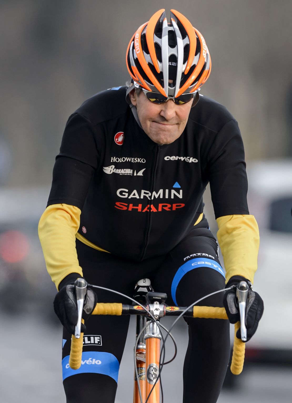 U.S. Secretary of State John Kerry rides his bike in Lausanne, Switzerland, in March.