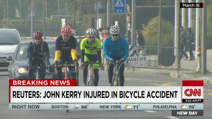 File photo of John Kerry riding his bike on March 18, 2015.