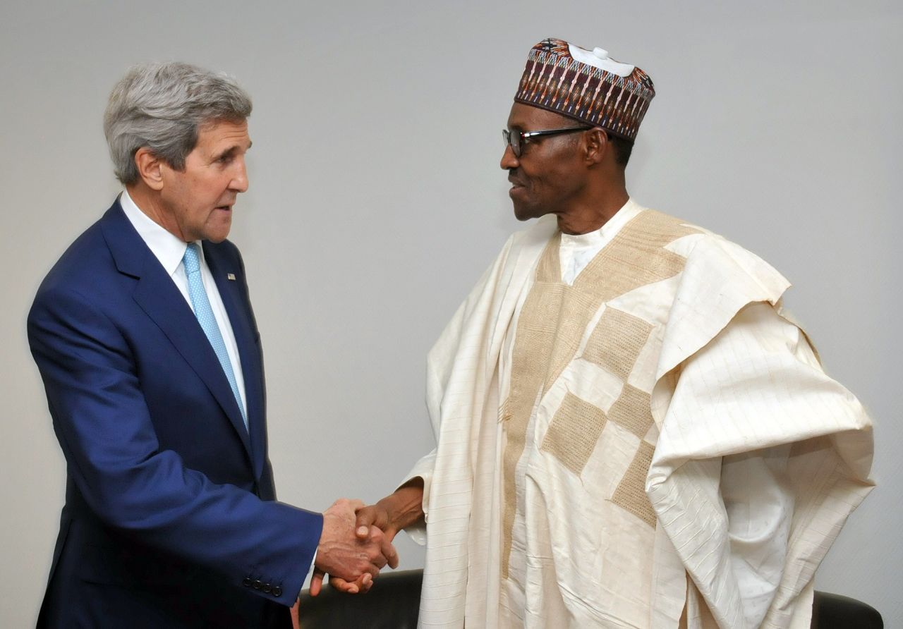 U.S. Secretary of State John Kerry shakes hands with Nigerian President Muhammadu Buhari on Wednesday, May 29, shortly after Buhari's inauguration in Abuja, Nigeria.