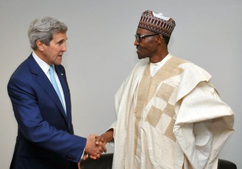 U.S. Secretary of State John Kerry shakes hands with Nigerian President Muhammadu Buhari on Wednesday, May 29, shortly after Buhari's inauguration in Abuja, Nigeria.