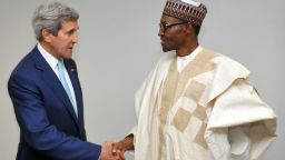 U.S. State Secretary John Kerry shakes hand with Nigerian President Mohammadu Buhari on Wednesday, May 29, shortly after his inauguration at Eagles Square in Abuja, Nigeria.
