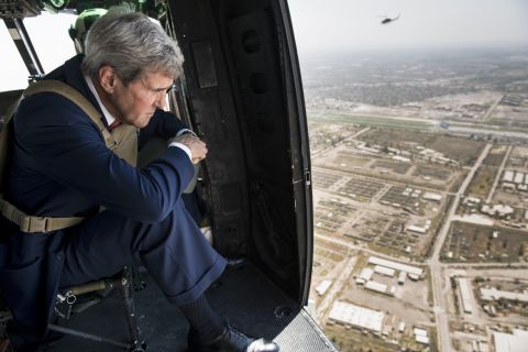 Kerry looks out over Baghdad, Iraq, from a helicopter on September 10, 2014. Kerry flew into Iraq for talks with its new leaders on their role in a long-awaited new strategy against ISIS militants.