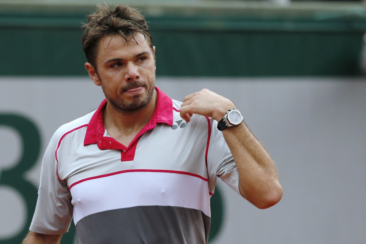 Stanislas Wawrinka wasted little time in ending the hopes of French ace Gilles Simon in the last 16 and could meet Federer in the quarters.