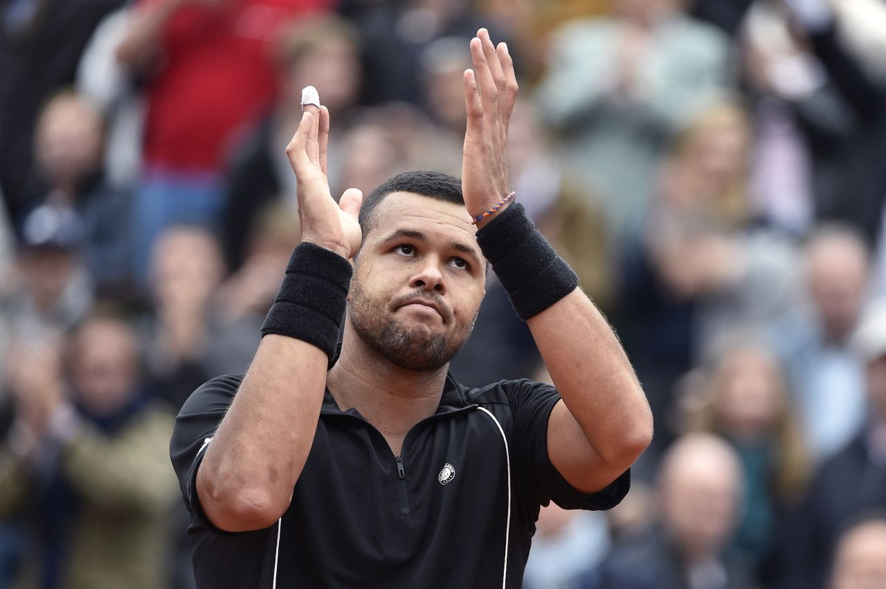 Jo-Wilfried Tsonga became the first Frenchman to reach the quarterfinals of this year's grand slam at Roland Garros as he beat Tomas Berdych.