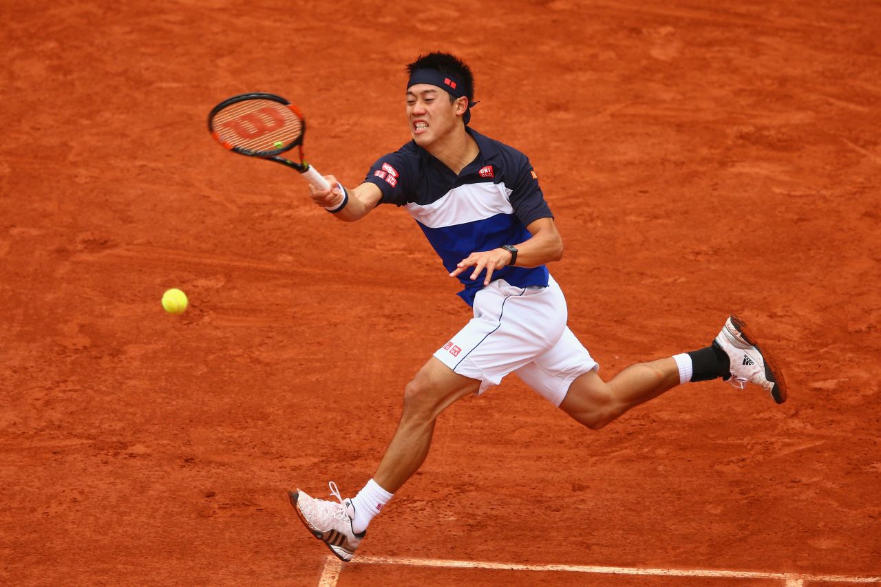 Kei Nishikori at full stretch on his way to victory over Teymuraz Gabashvili of Russia in the fourth round of the French Open. 