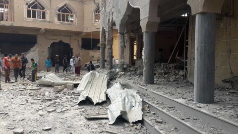Residents examine a damaged mosque after an Iraqi Air Force bombing in the ISIS-seized city of Falluja, Iraq, on Sunday, May 31. At least six were killed and nine others wounded during the bombing.