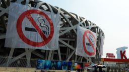 BEIJING, CHINA - MAY 30: (CHINA OUT) 'No Smoking' banners hang on the Bird's Nest on May 30, 2015 in Beijing, China. Beijing will launch new principles on 'No Smoking' on June 1 to control the smoking situation. It' said that Beijing airports, railway stations, passenger stations and bus stations will have no smoking rooms.