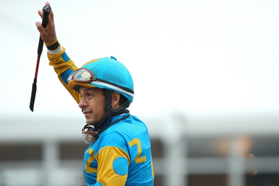 Espinoza waves to the crowd after winning the Preakness.