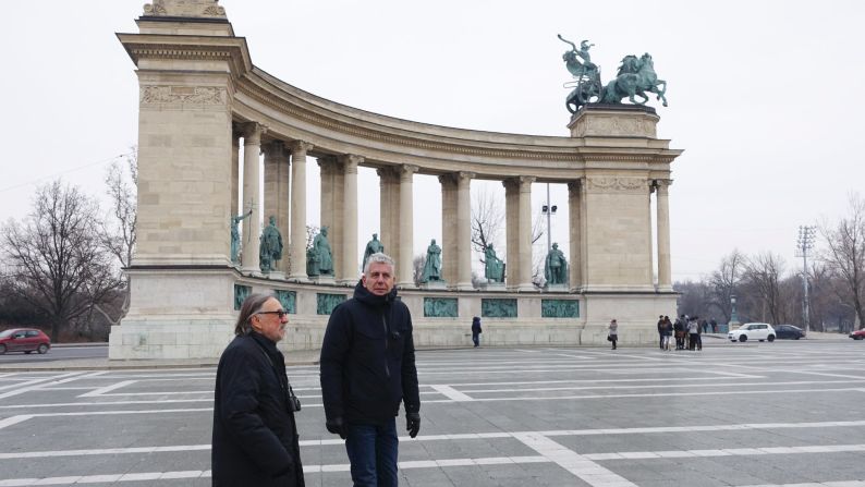 Anthony Bourdain and legendary Hollywood cinematographer Vilmos Zsigmond ("Deliverance," "Close Encounters of the Third Kind," "Deer Hunter" and more) walk through Hősök tere (Heroes' Square) in Budapest, Hungary.