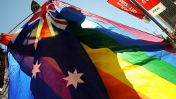 A protester shows his colours during a gay rights march through Sydney to the ruling Labor Party's conference to stage a mass 'illegal wedding' stunt on August 1, 2009. The national Labor conference voted to develop a system for the registration and recognition of same-sex relationships, after gay rights advocates failed to gather enough numbers for a resolution to legalise gay marriage. Australian Prime Minister Kevin Rudd won the 2007 election on a platform that supported the former conservative government's legal definition of marriage as a union between a man and a woman. AFP PHOTO/Torsten BLACKWOOD (Photo credit should read TORSTEN BLACKWOOD/AFP/Getty Images)