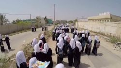 gaza school girls walk home drone natpkg_00001018.jpg