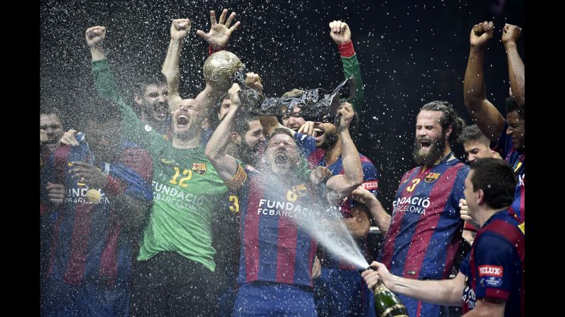 FC Barcelona's handball team celebrates after winning the Champions League final Sunday, May 31, in Cologne, Germany. No team has won the European tournament more than Barcelona. This was its ninth title since 1991.