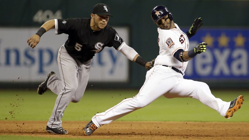 Jonathan Villar of the Houston Astros is tagged out by Carlos Sanchez of the Chicago White Sox during a Major League Baseball game in Houston on Saturday, May 30.
