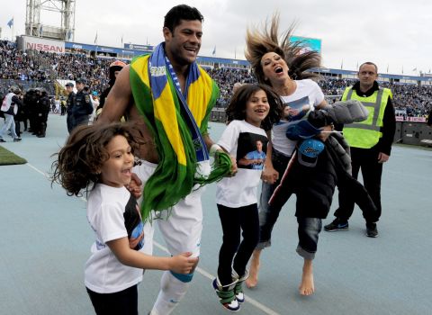 Hulk, 28, celebrates winning the first division with his family on the pitch. The Brazilian will now head to Chile where he will compete in the Copa America, which starts on June 11.