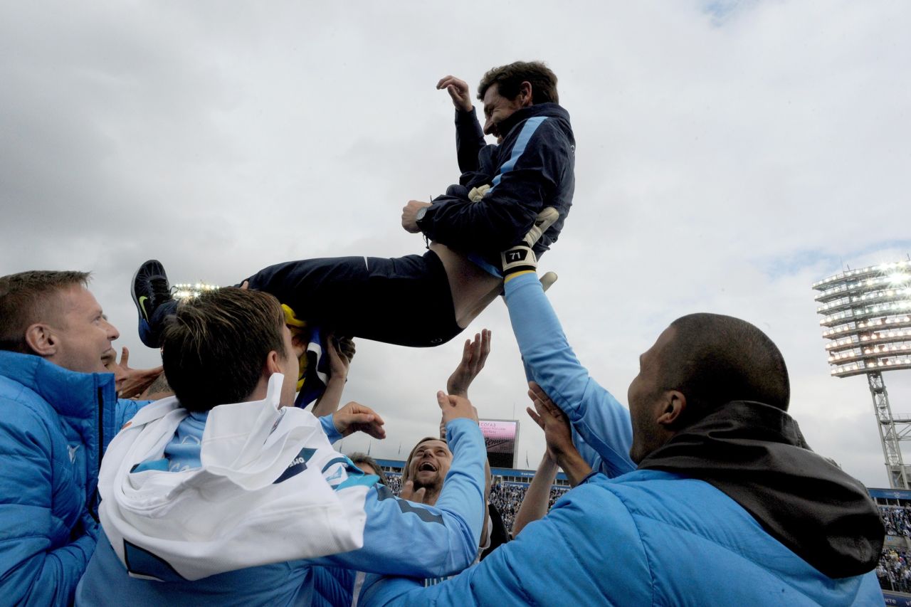 Manager Andre Villas-Boas is thrown into the air by Zenit players after guiding them to the league title in his first full season in charge.