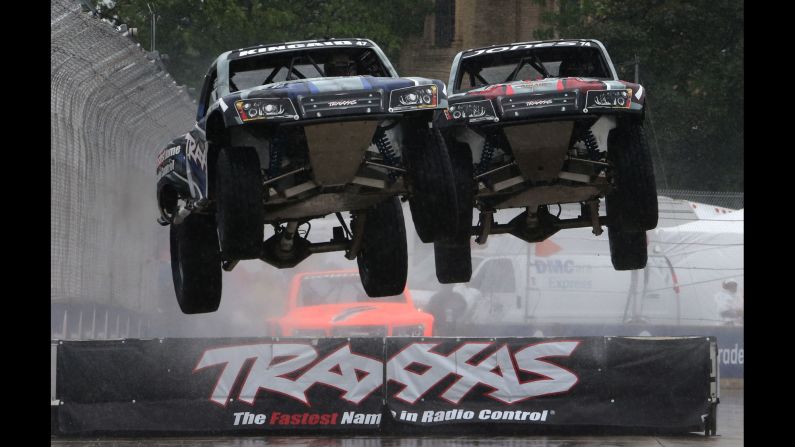 Keegan Kincaid, left, and P.J. Jones hit a jump during an off-road race in Detroit on Sunday, May 31.