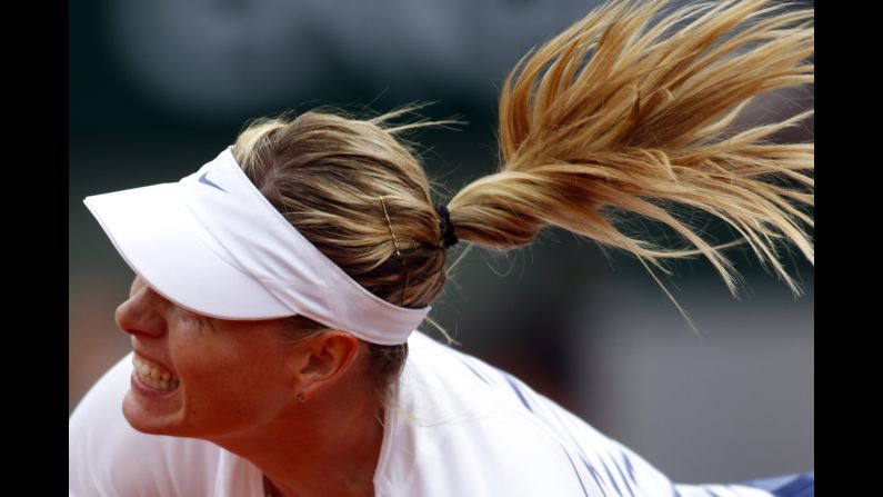 Maria Sharapova hits a shot during her third-round match at the French Open on Friday, May 29. Sharapova beat Samantha Stosur in straight sets.
