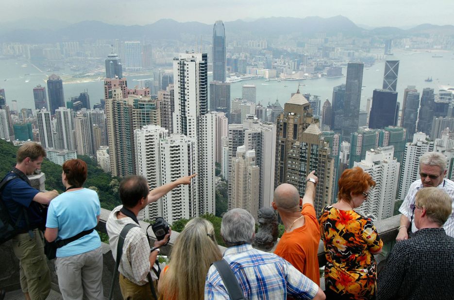 Futuristic skyscrapers next to traditional Chinese temples. It's expected that 8.66 million international visitors will come to Hong Kong in 2015, according to MasterCard's latest Global Destination Cities Index.