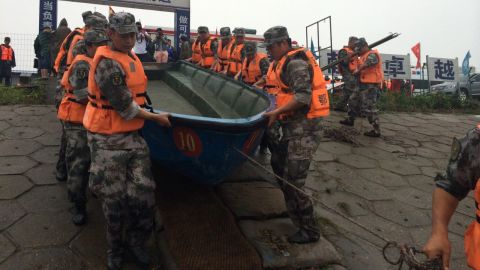Rescue workers prepare a boat for the search on June 2.