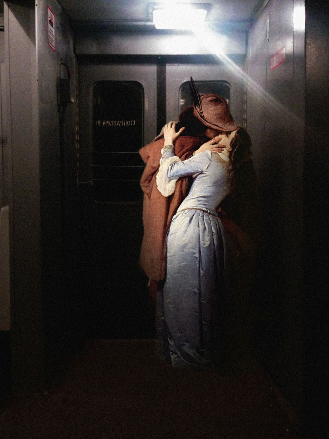 Italian Romantic Francesco Hayez portrays a couple from the Middle Ages in "The Kiss" (1859), the intense moment catapulted from courtly surrounds into a midnight train carriage by Kondakov. 