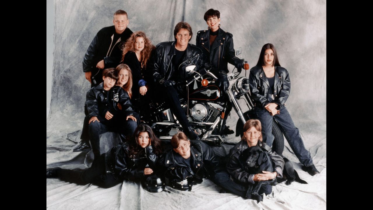 The Jenner-Kardashian family poses for a portrait in 1993. Kris and Jenner each had four children when they were married. Clockwise from top left, the kids are Burton Jenner, Khloe Kardashian, Kim Kardashian, Brandon Jenner, Brody Jenner, Kourtney Kardashian, Cassandra Jenner and Rob Kardashian.