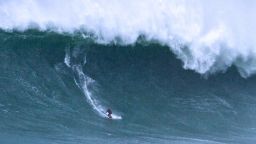 Andrew Cotton in the midst of a big wave