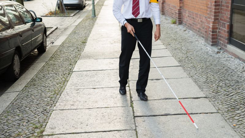 NextImg:This cane for the blind recognizes faces from 30 feet away | CNN Business