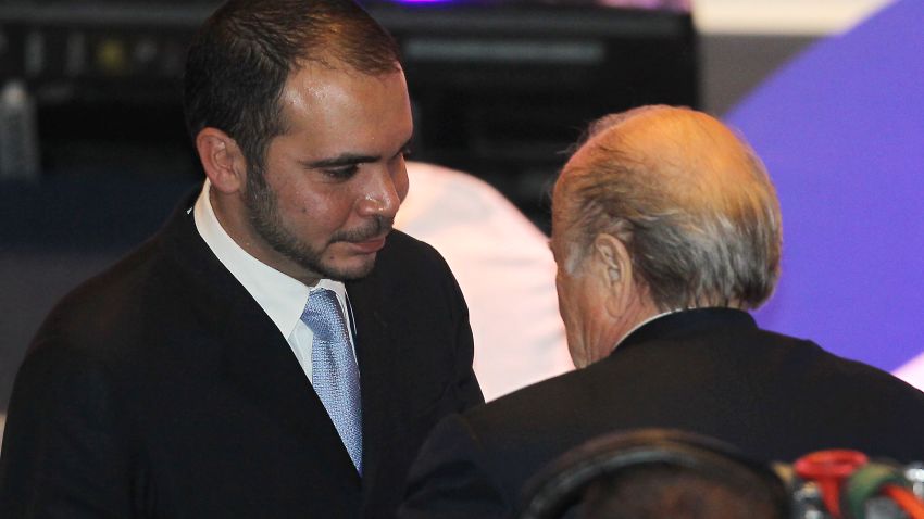 FIFA president Joseph Blatter (R) congratulates Jordan's Prince Ali bin al-Hussein, head of the Jordan Football federation, after he won the votes of the Asian Football Confederation for the FIFA vice-presidency during the 24th AFC Congress in Doha on January 6, 2011.
