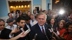 Former Florida Governor Jeb Bush and possible Republican presidential candidate speaks to the media after addressing the Rick Scott's Economic Growth Summit held at the Disney's Yacht and Beach Club Convention Center on June 2, 2015 in Orlando, Florida. Many of the leading Republican presidential candidates are scheduled to speak during the event.