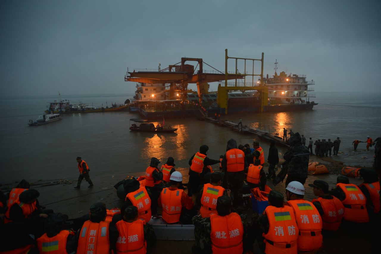 Rescuers search for survivors from the capsized ship in the Yangtze River in Jingzhou on June 2.