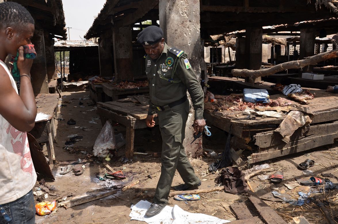 A Nigerian policeman inspects the site of a suicide attack by Boko Haram at a busy cattle market in the northeastern Nigerian city of Maiduguri in June, 2015. Boko Haram overtook ISIS as the world's deadliest terror group last year, according to the Global Terrorism Index, while Nigeria had the biggest year-on-year increase in terrorism, with deaths up more than 300%.
