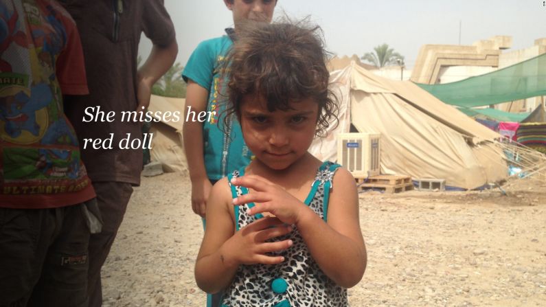 A red doll. Yara says she was unable to bring the toy because it was "sleeping" when her family fled.  