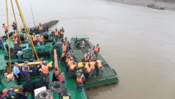Rescue personnel prepare to remove the remains of victims who were travelling on the capsized passenger ship Dongfangzhixing or "Eastern Star" in the Yangtze river at Jianli in China's Hubei province on June 3, 2015. Relatives of more than 400 people missing after a cruise ship capsized on China's Yangtze river were hoping for a "miracle" on June 3, as authorities said they were racing against time to find any survivors. CHINA OUT AFP PHOTOSTR/AFP/Getty Images