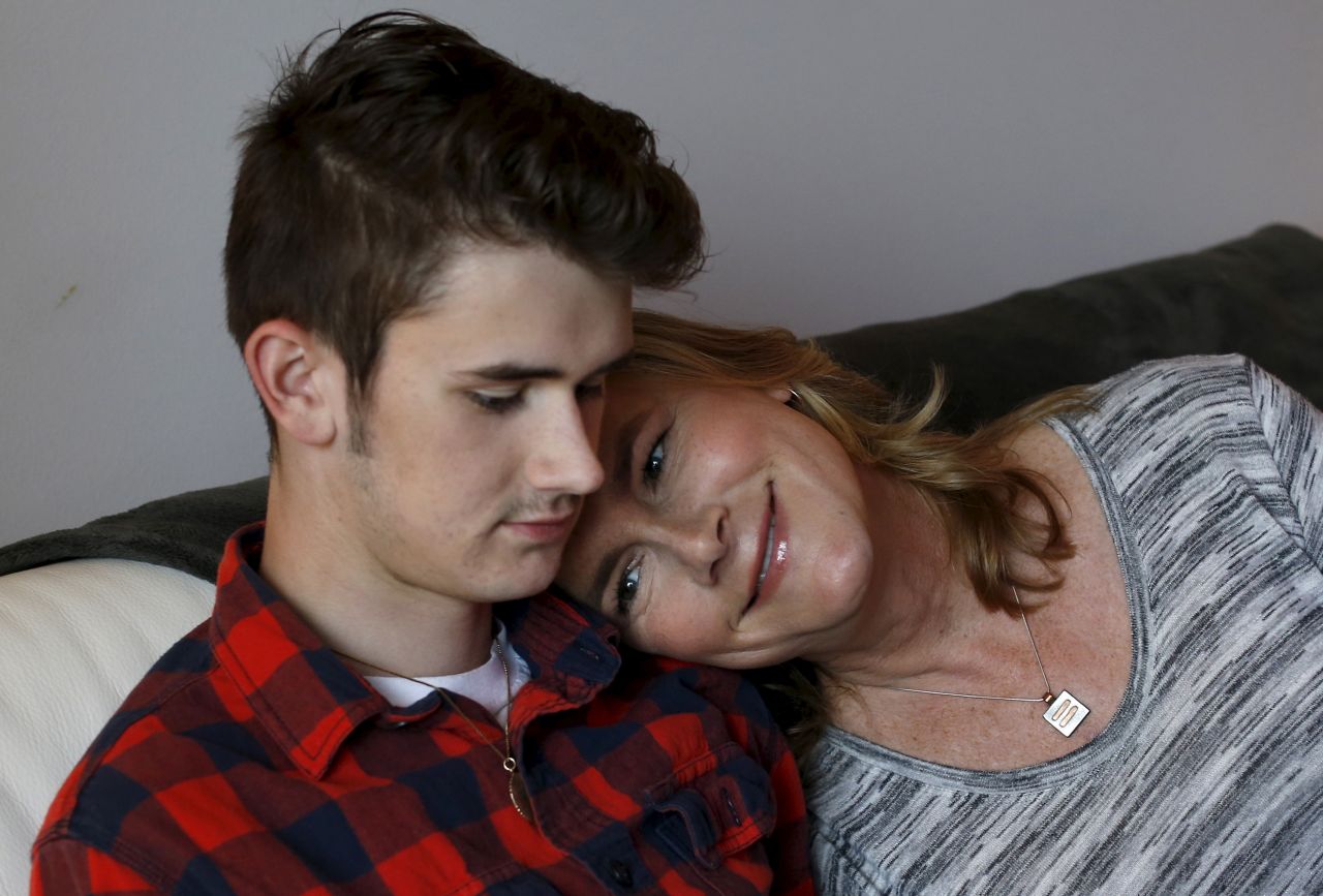 Carly Lehwald sits with her son Ben at her home in Chicago on Saturday, May 30. Carly is transitioning to life as a woman, and her story is the basis for a new reality television show called <a href="http://abcfamily.go.com/shows/becoming-us" target="_blank" target="_blank">"Becoming Us."</a>