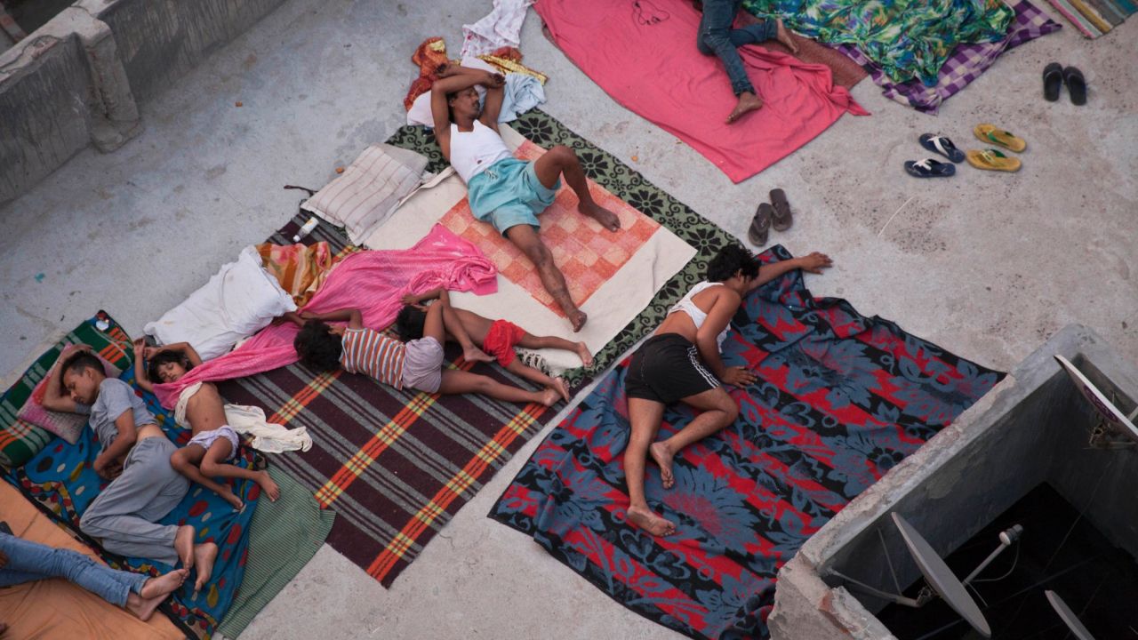 People in New Delhi sleep on the roof of a house to beat the heat on Friday, May 29. <a href="http://www.cnn.com/2015/05/26/world/gallery/india-deadly-heat-wave/index.html" target="_blank">A blistering heat wave in India</a> has killed more than 1,300 people in the country. <a href="http://www.cnn.com/2015/05/29/world/gallery/week-in-photos-0529/index.html" target="_blank">See last week in 39 photos</a>