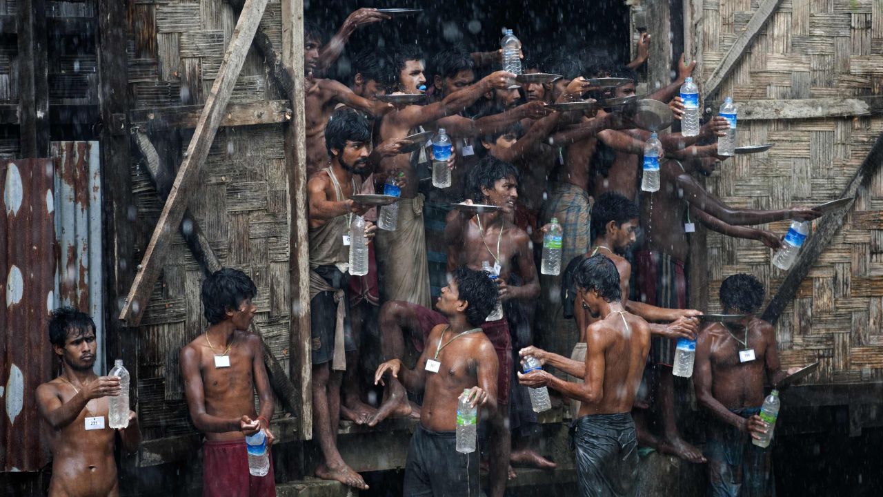 Migrants who were found at sea collect rainwater at a temporary shelter in Myanmar on Thursday, June 4. Myanmar, which has previously disavowed responsibility for Rohingya migrants stranded at sea, has said <a href="http://www.cnn.com/2015/05/22/asia/asian-boat-migrants-rescue/index.html" target="_blank">it will provide search and rescue for "boat people" in its territorial waters.</a> Thousands of Rohingya -- minority Muslims in Myanmar -- and economic migrants from Bangladesh have taken to sea in recent weeks, hoping to settle elsewhere in Southeast Asia.
