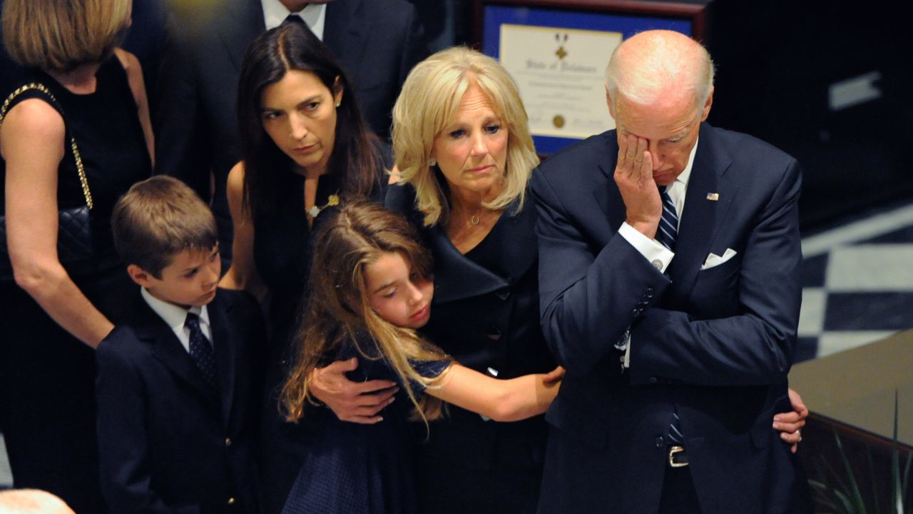 Vice President Joe Biden rests his head in his hand during <a href="http://www.cnn.com/2015/06/04/politics/gallery/beau-biden-wake/index.html" target="_blank">a viewing for his late son,</a> former Delaware Attorney General Beau Biden, on Thursday, June 4. Beau Biden died of brain cancer May 30 at the age of 46. Standing with the vice president, from right, is his wife, Jill, and Beau Biden's immediate family: daughter Natalie, wife Hallie and son Hunter.