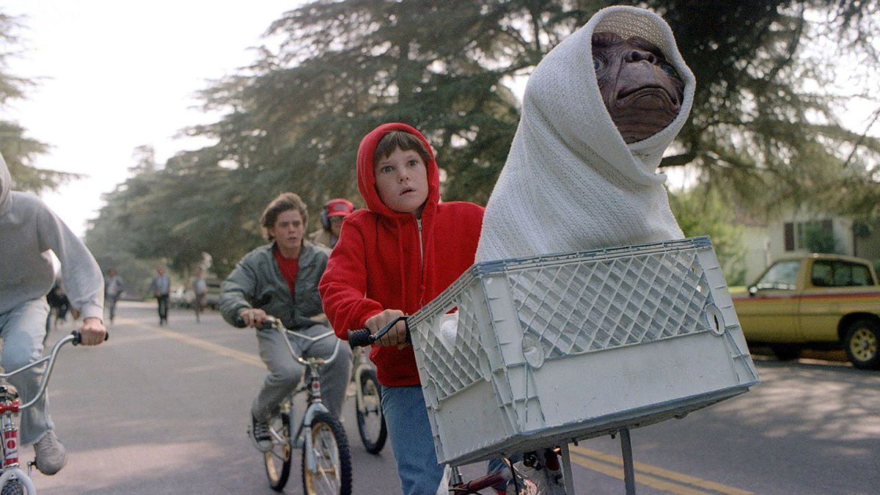 Steven Spielberg's "E.T.: The Extra-Terrestrial" was released in 1982 and is the top-grossing movie of the 1980s. Keep clicking for the other top moneymaking movies of the decade.