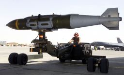  A weapons loader prepares a 2,000-pound GBU-31 joint direct attack munition for a mission during Operation Iraqi Freedom.