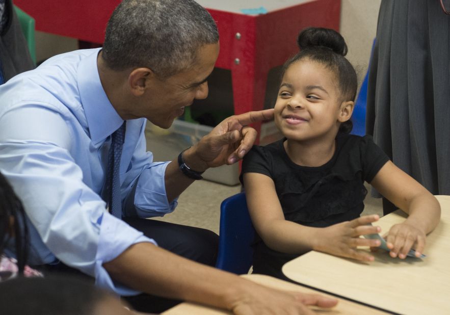 Obama talks with Akira Cooper during a visit to a classroom at the Community Children's Center, one of the country's oldest Head Start providers, in Lawrence, Kansas, in January.