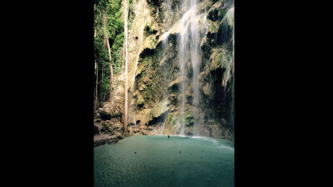 Aside from the whale sharks, the Tumalog waterfalls, which cascade into a serene turquoise pool, are another natural local attraction.