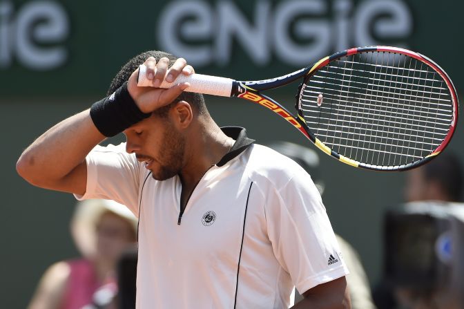Their early-afternoon contest was played in heat that hit about the mid-30s Celsius. Tsonga lost for a second time to Wawrinka at Roland Garros.