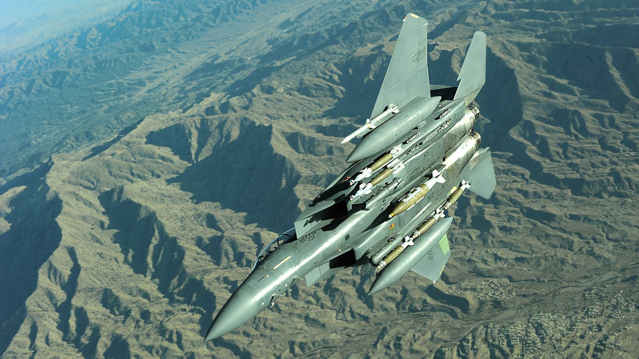 An F-15E Strike Eagle, capable of carrying JDAM bombs, flies a combat patrol mission over Afghanistan.